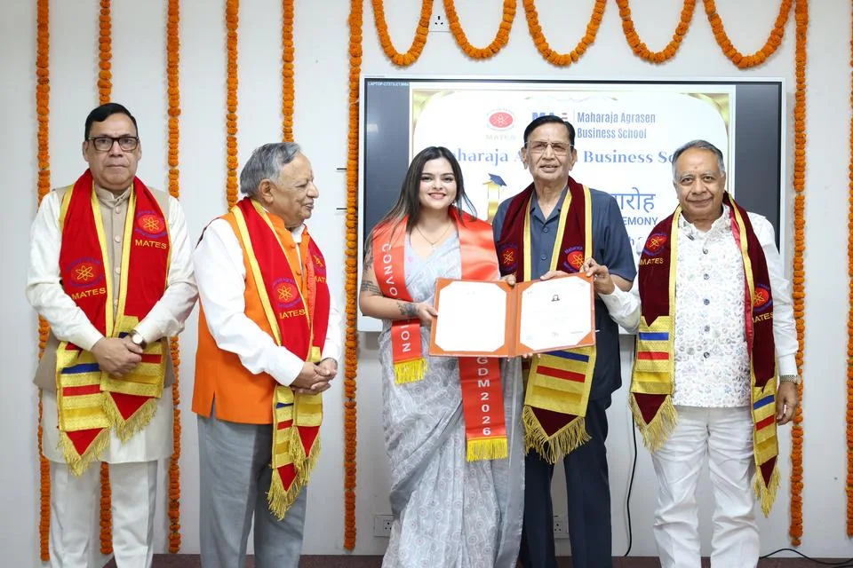 A graduate receives the PGDM diploma