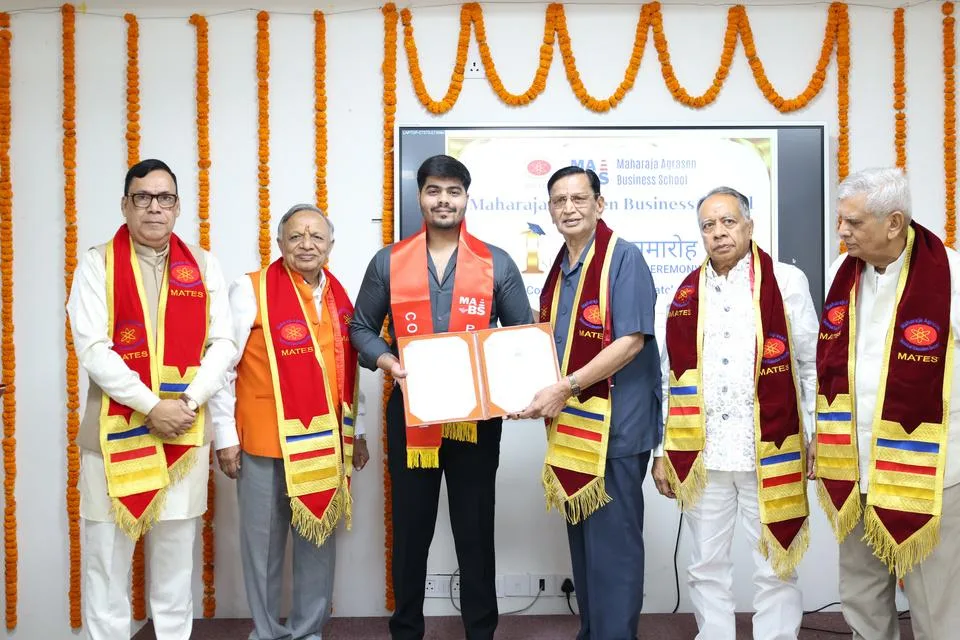 A graduate receives the PGDM diploma
