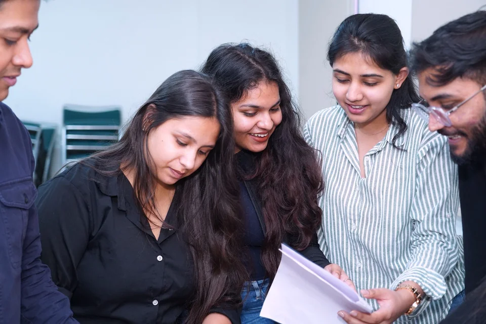 MABS students working on a venture plan together